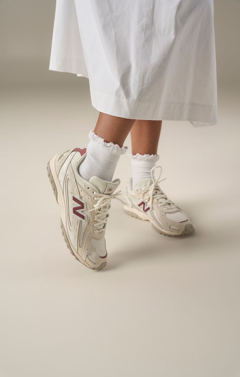 A close up of 204 sneakers